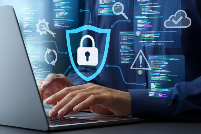 Cybersecurity icon on man using computer